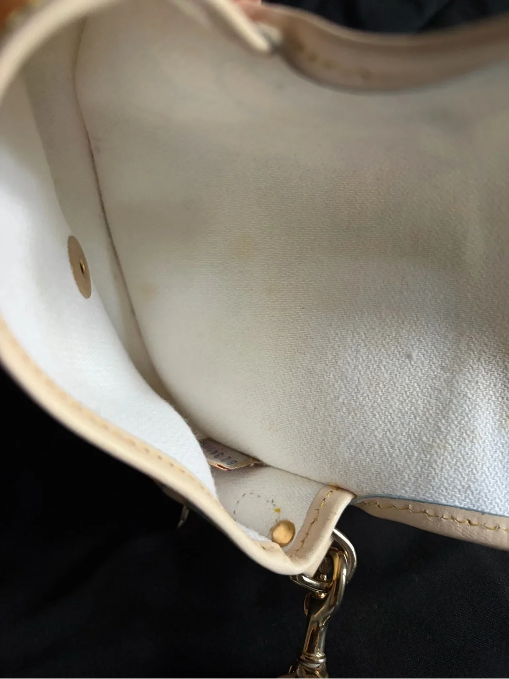 Dooney & Bourke cute cream